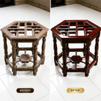 A side-by-side comparison showing a hexagonal wooden side table or stool in two finishes: a weathered brown wood finish labeled 'BEFORE' and a polished dark reddish-brown wood finish labeled 'AFTER', set on a white tiled floor.